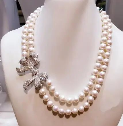 

Handmade high-end natural freshwater 8-9mm white pearl micro inlay zircon stereo bowknot luxury short necklace fashion jewelry