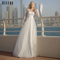 elegant tulle wedding dresses 2022 a line sheer o neck lantern long sleeve appliques beach bridal gown lace up floor length