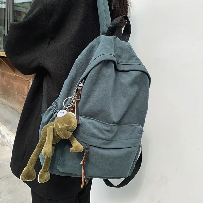 

Solid Color Classics Women's Backpack Female Casual Fashion Pendant Backpack Simple Shoulder Backpack For Teenager Girls