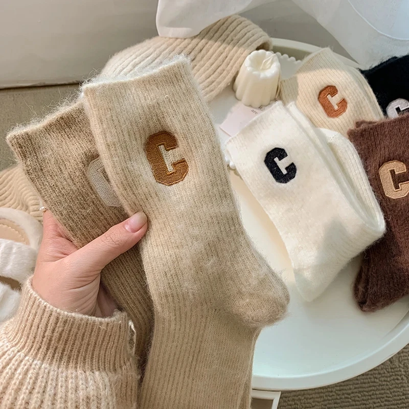 

2023Luxury women's wool socks warm warm thick cashmere casual Japanese fashion solid color comfortable home socks high quality