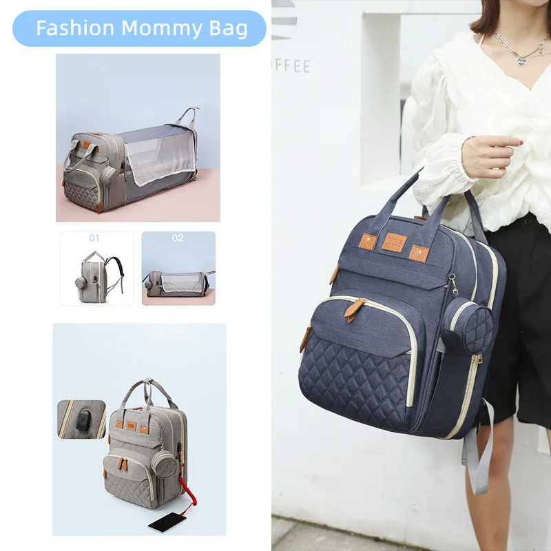 

2022 Fashion Portable Foldable Baby Bed Mommy Bag Multifunctional Large Capacity Waterproof Mother And Baby Bag sac a langer