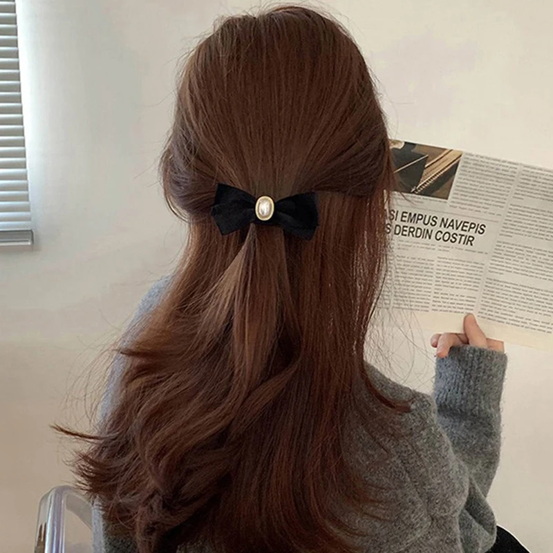 

Pearl super elastic velvet simple temperament black head rope bow hair tie rubber band to tie the hair