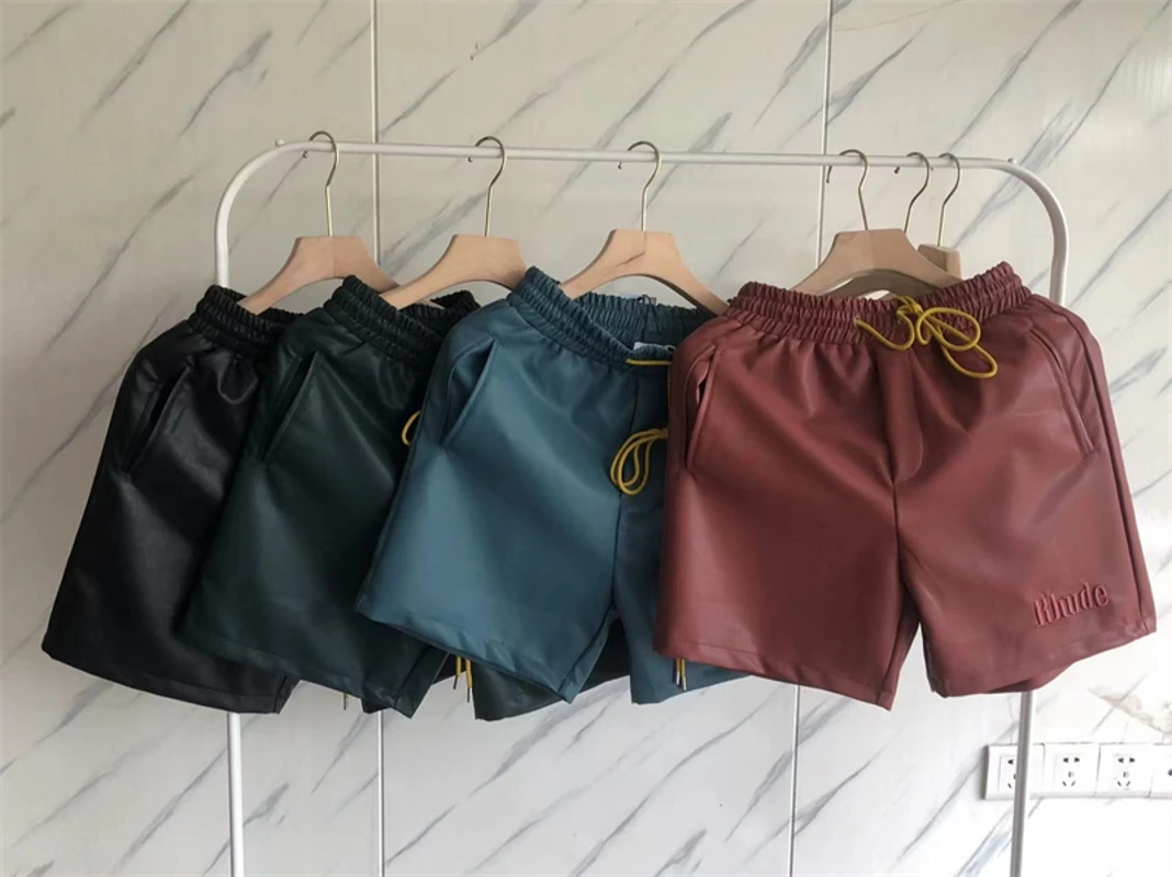 

Новые кожаные шорты ревеня для мужчин и женщин лучшее качество вышитый логотип ревеня Бриджи на шнурке с эластичной талией
