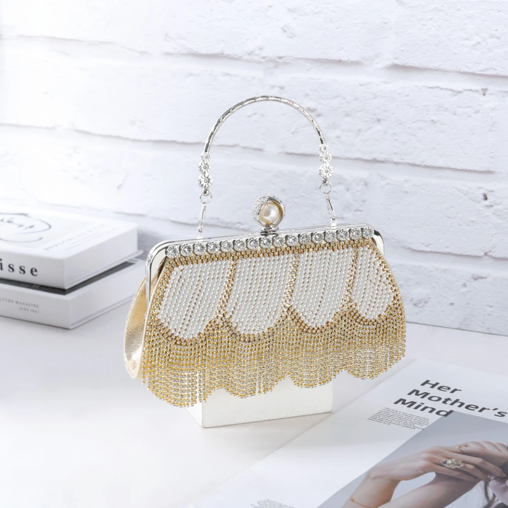 

2022 Fashion Tassel Dinner Handbags Designer Wild Women Diamond Luxury Buckle Shoulder Crossbody Bag Summber Beach Bali Purse