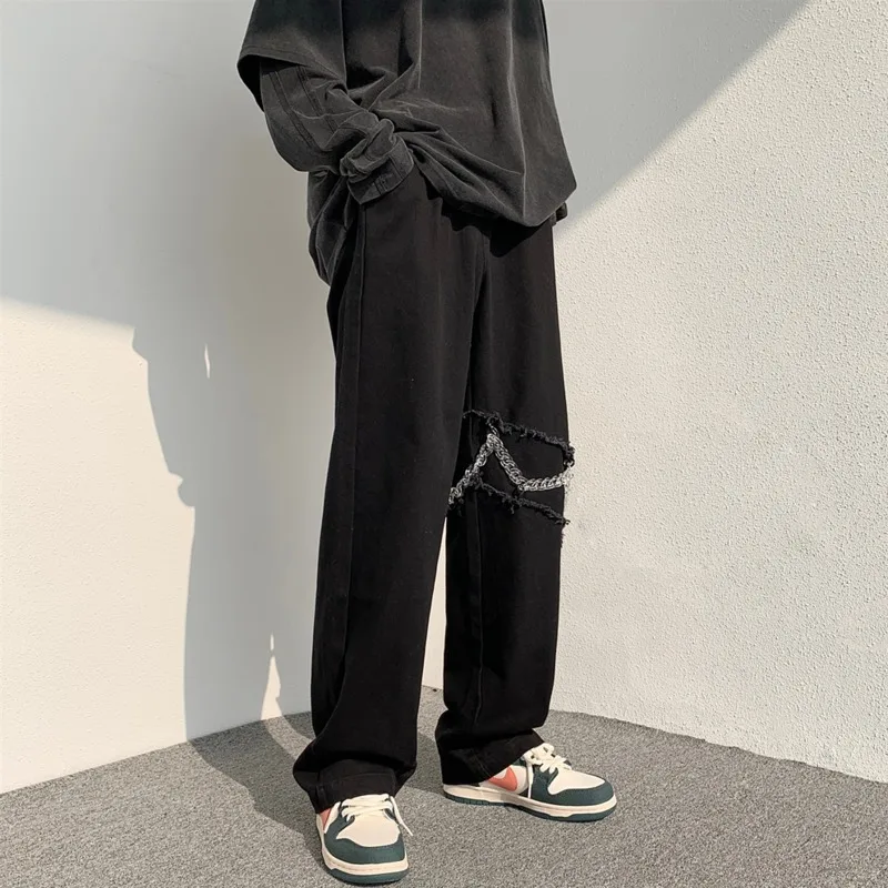 

Мужские модные повседневные мешковатые джинсы с дырками абрикосового/черного цвета, мужские уличные свободные прямые джинсовые брюки в ст...