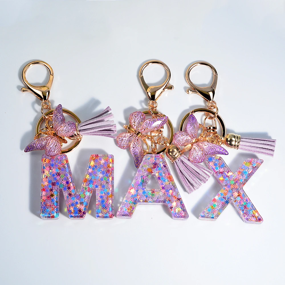 

Classic Snowflakes 26 Letters Keychain Pink Purple Resin Initial Alphabet Keyrings With Butterfly Tassel For Women Purse Handbag