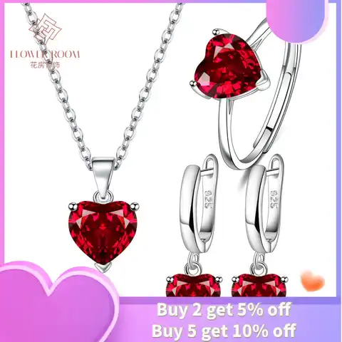 Women's ring with a heart -shaped pendant, with zircon