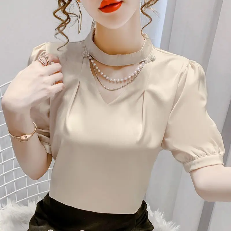 

Short -sleeved chiffon shirt female loose pearl chain hanging neck shirt 2022 summer new style foreign pure blouse top female