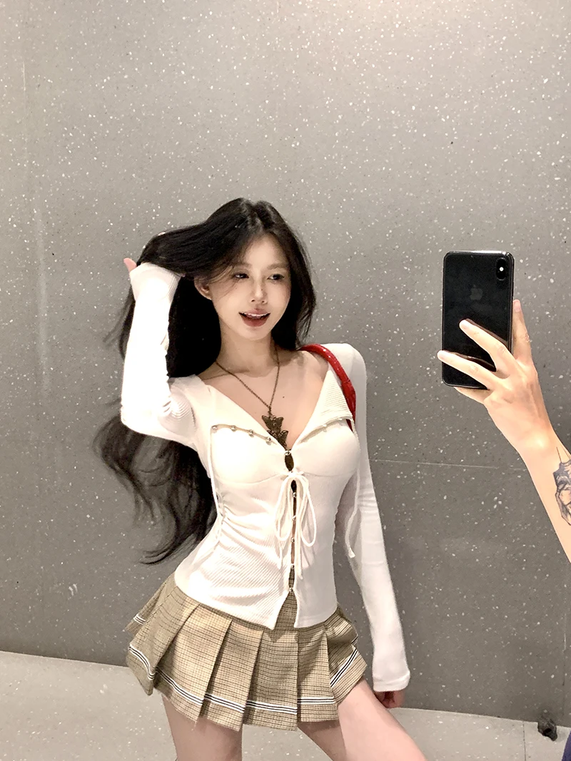 Осень и зима Популярный в этом году белый топ со шнуровкой v-образным вырезом