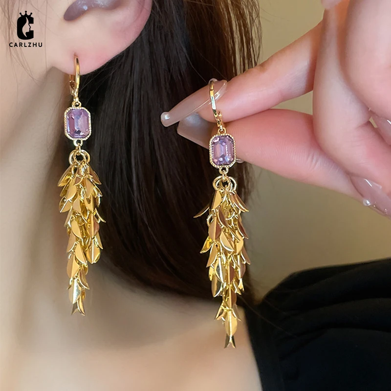 

Серьги-подвески женские с длинными кисточками и листьями