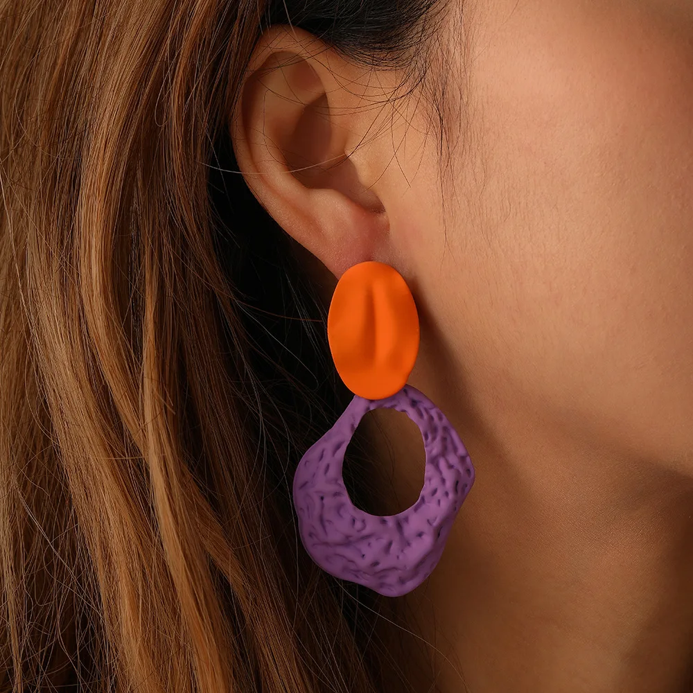 

Fashion Minimalist Color Painting Dangle Earrings Hollow Rock Pattern Oval Earrings For Women Jewelry Wholesale