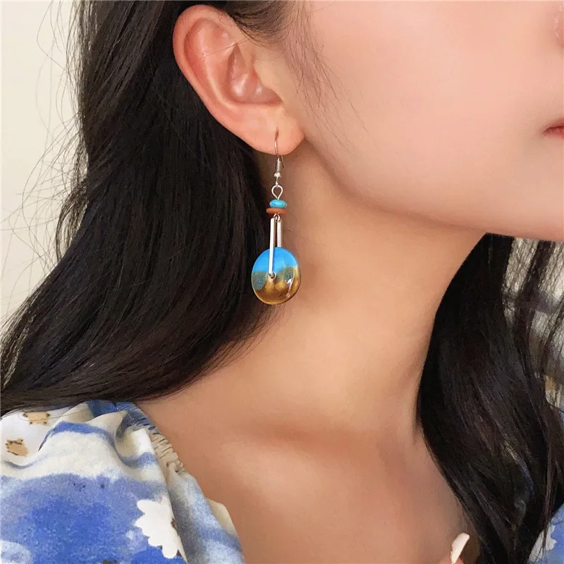 Серьги-гвоздики в европейском и американском стиле с синими камнями