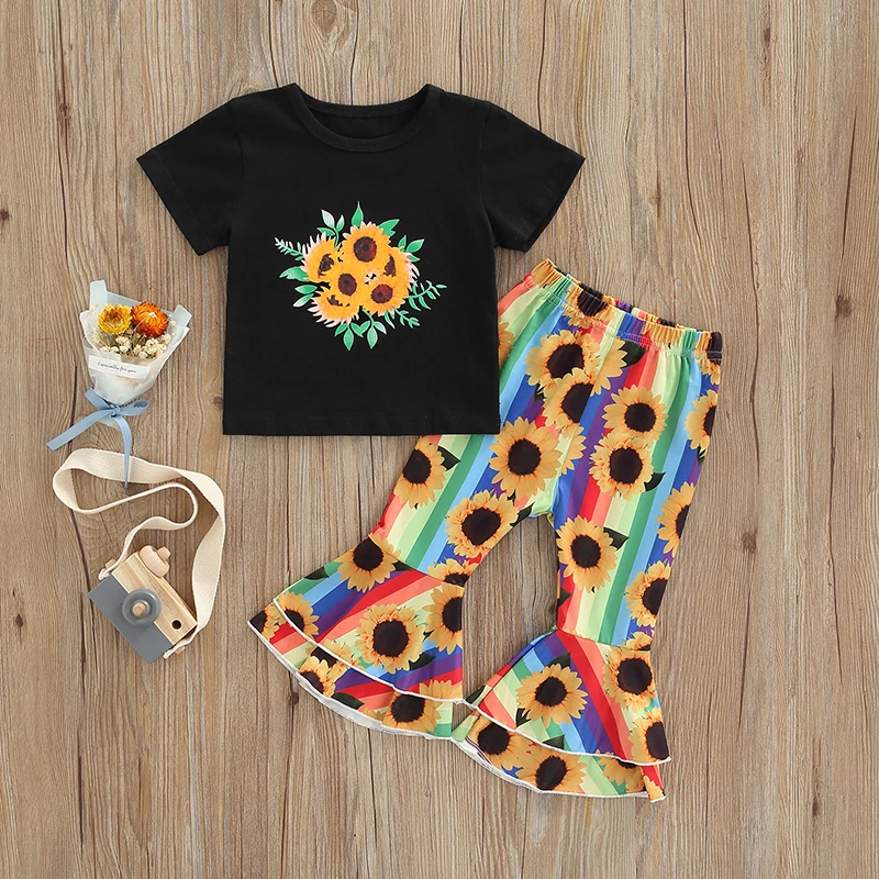 

Летний женский костюм из двух предметов для маленьких девочек 18-6 лет, футболка с коротким рукавом, топы, расклешенные длинные брюки с принто...