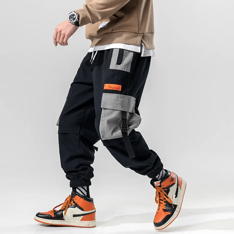 

Брюки-карго мужские в стиле хип-хоп, джоггеры с эластичным поясом, повседневные модные брюки в стиле пэчворк, со множеством карманов, свободные штаны-султанки, уличная одежда