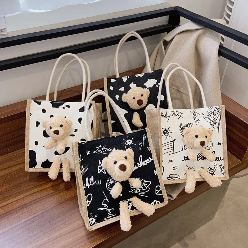 

2022 Ins New Simple Fashion Cute Small Bear Handle Bag for Women College Students Girls Japanese Cartoon Canvas Lunch Study Bags