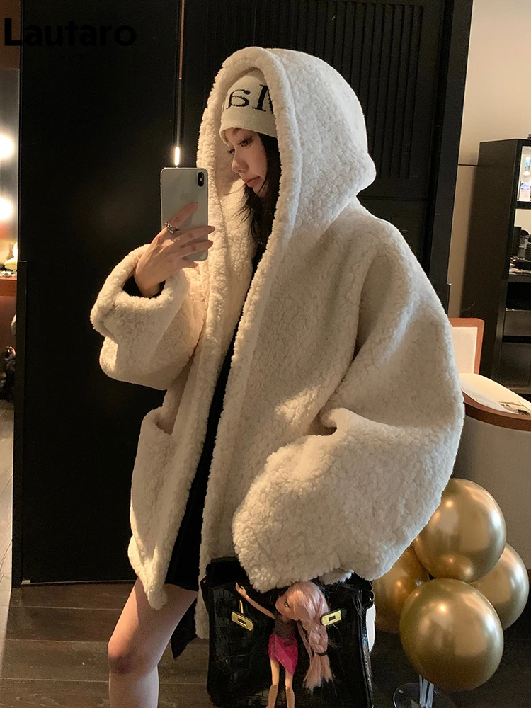 

Lautaro Autumn Winter Oversized White Soft Thick Warm Faux Lambswool Fur Coat Women with Hood Luxury Designer Fluffy Jacket 2023