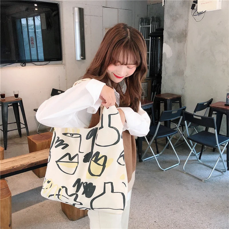 

New Japan Style Simple Graffiti Print Lines Casual Solid Shoulder Bag Canvas Bag Shopping Bags for Men and Men 2023