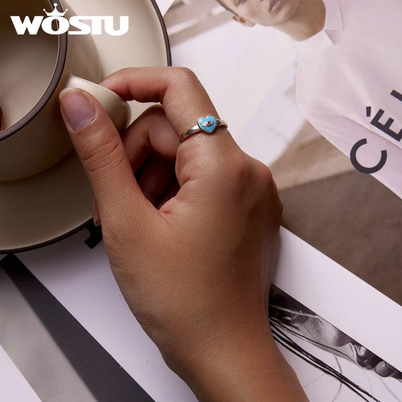 Женское кольцо с голубым сердечком и демоном