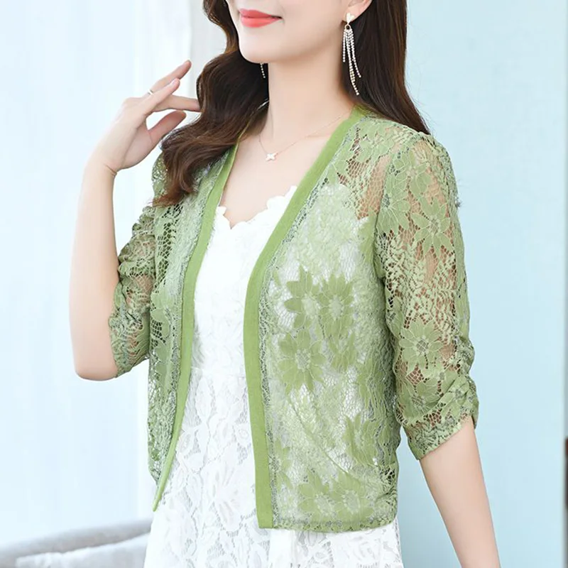 

Elegant Solid Color Spliced Loose Hollow Out Lace Shirt Women Clothing 2023 Summer New Casual Tops All-match Office Lady Blouse