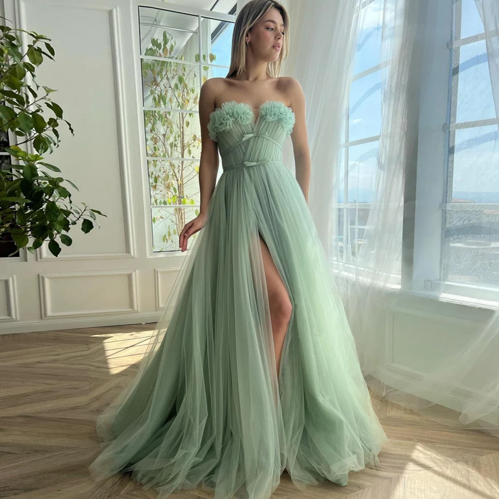 Бальное платье из фатина с оборками зеленое а-силуэт многослойное для выпускного