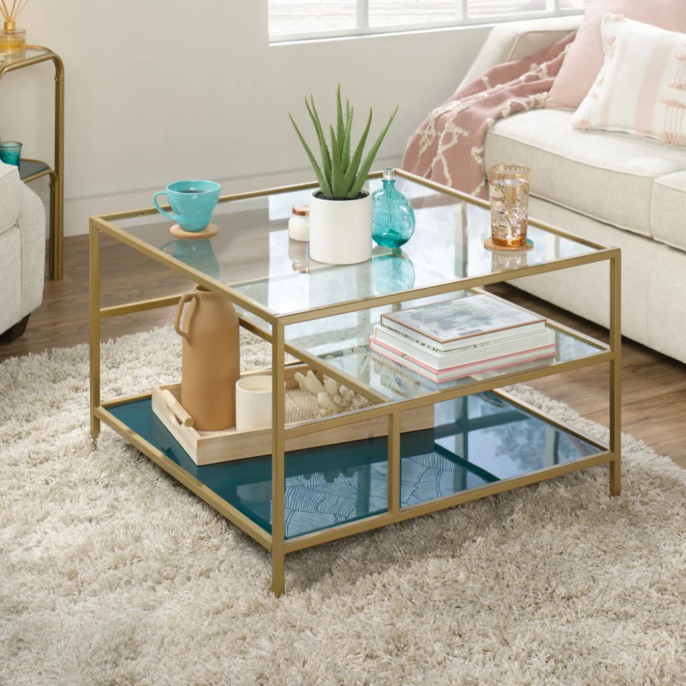 

Sauder Coral Cape Square Glass Coffee Table with Shelves, Satin Gold/Clear