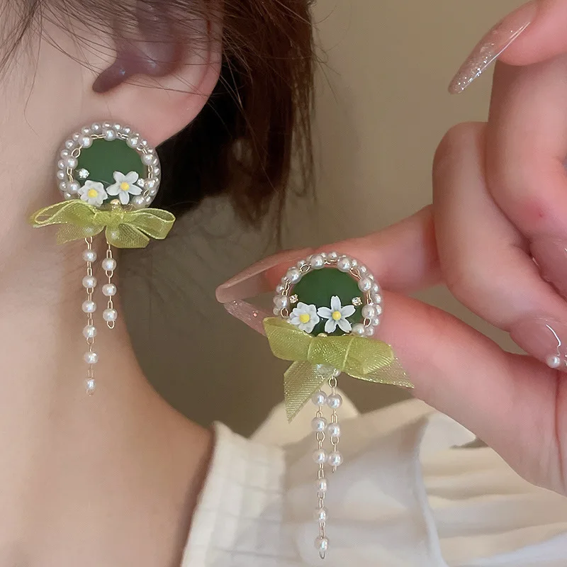 

Pearl flower bow earrings small fresh green girl heart earrings