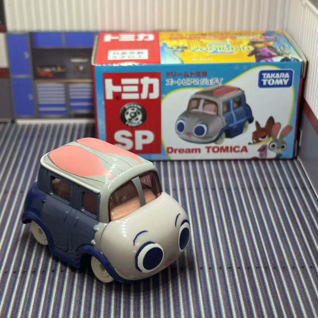 Фото TAKARA TOMY Zootopia 2, игрушечный автомобиль из сплава, Goody Carry, имитация игрового автомобиля, тема Диснея, модель без дистанционного управления, игрушка №2