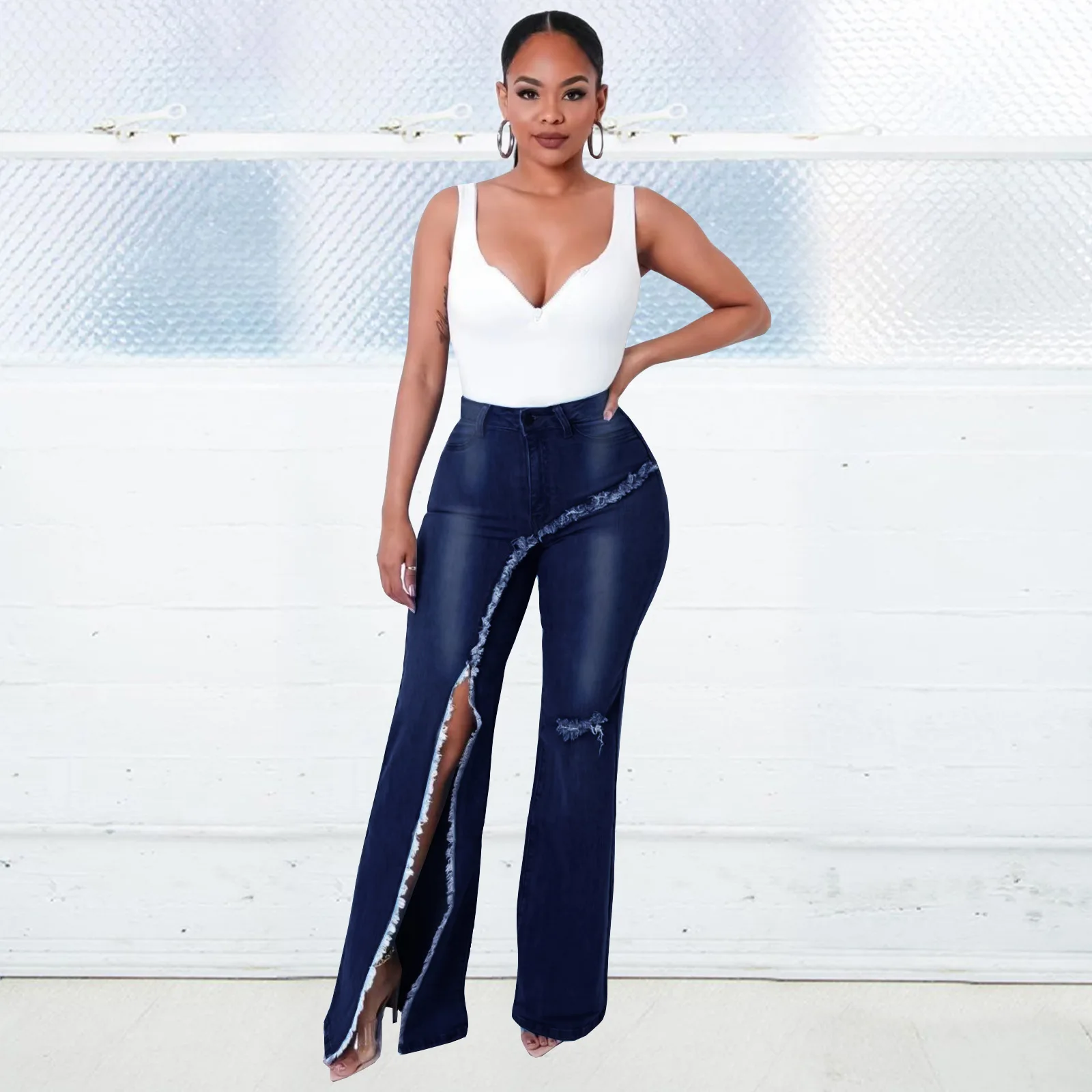 Women's 2022 spring and autumn new street INS personality stitching split high waist ripped jeans trousers spot