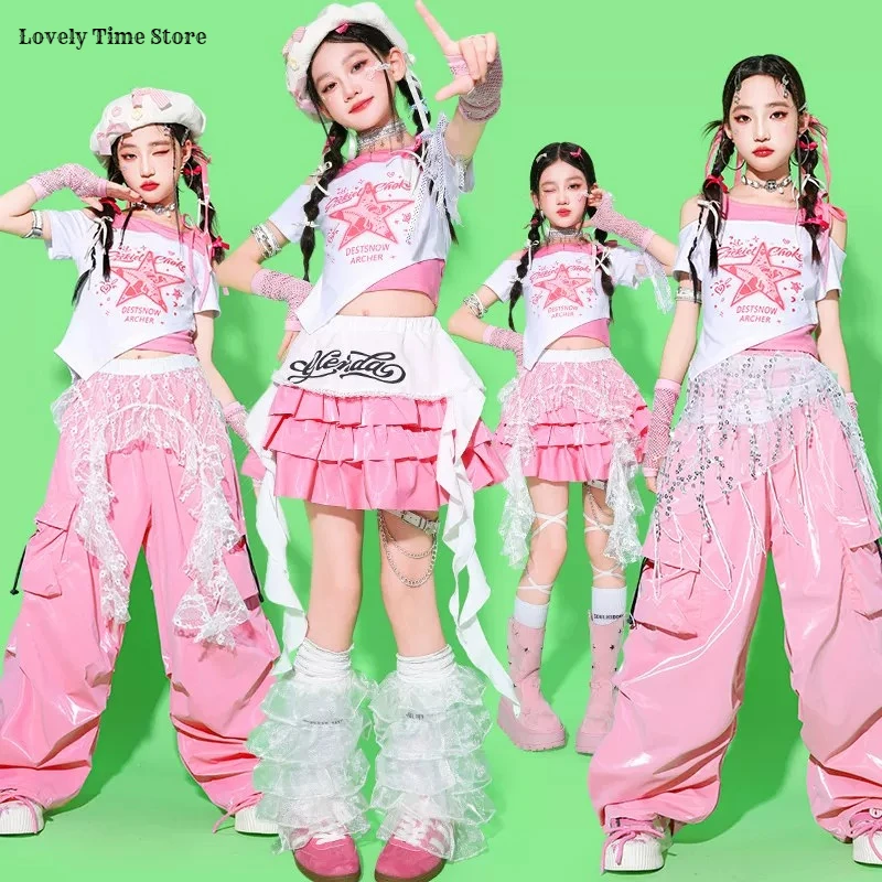 Фото Комплекты одежды для девочек: укороченный топ в стиле K-pop, розовые брюки карго, юбки для уличных танцев, детские костюмы, хип-хоп уличная одежда, джазовые наряды для девочек-групп №2