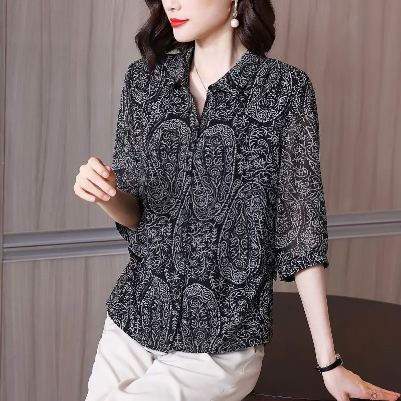 

High -end chiffon blouse summer 2022 new casual national wind retro seven -point sleeve printed turn down collar blouse top girl