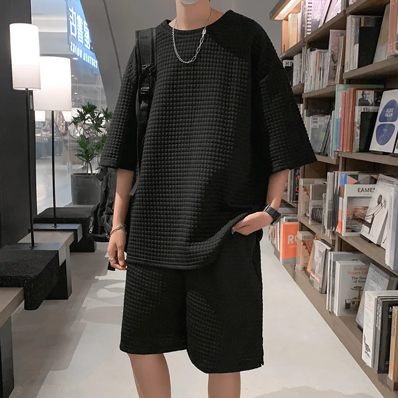 

Summer waffle T-shirt simple leisure fashion sports suit men's Hong Kong Style ins loose solid color short sleeved Capris two-pi