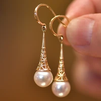 classic white round imitation pearls earrings exquisite fashion metal gold color carved pagoda dangle earrings for women