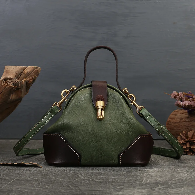 Genuine leather women's bag 2023 new style lock button dumplings bag advanced sense single shoulder messenger bag retro handbag