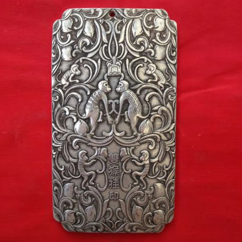 

Статуэтка обезьян из тибетского серебра