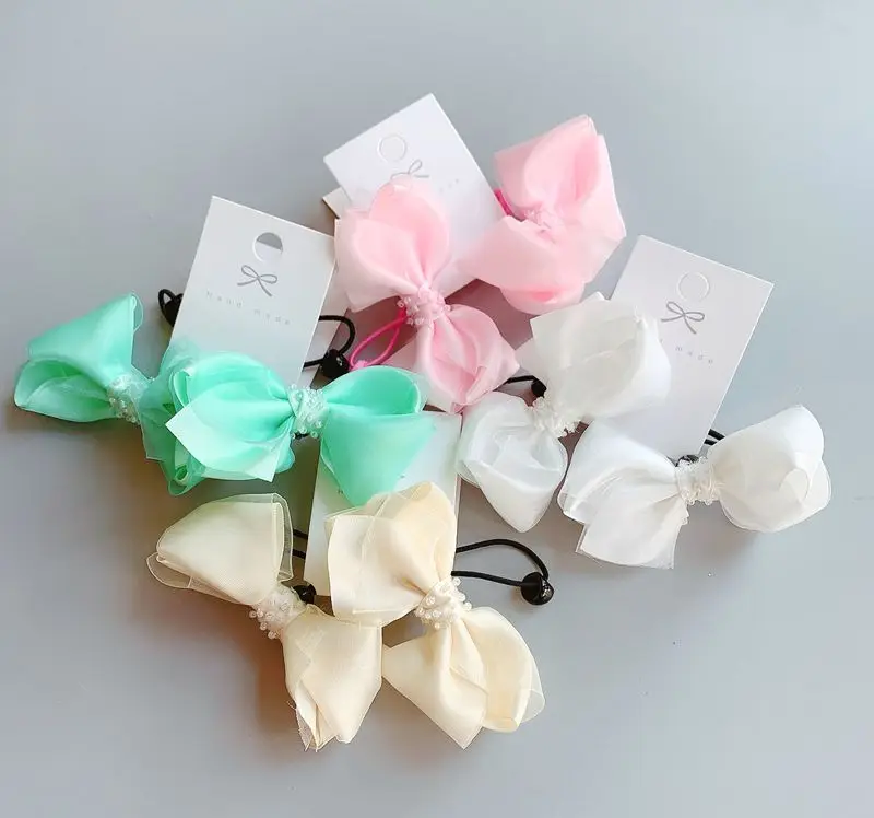 

New children's hair accessories snow yarn bow children's press clip hair rope
