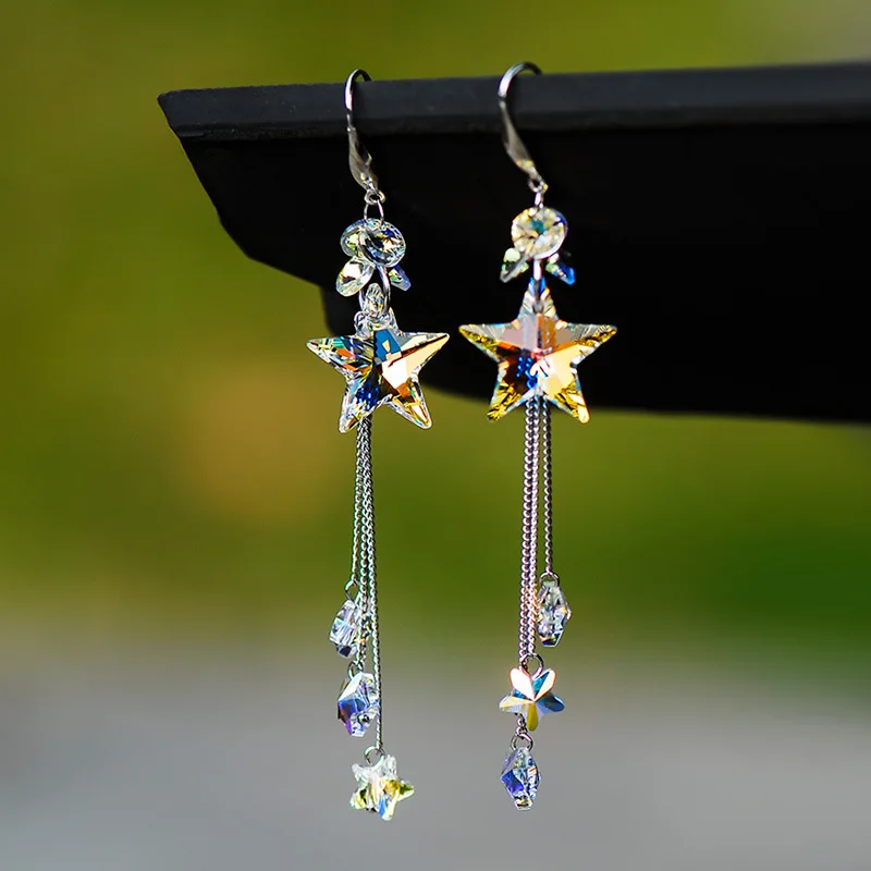 

New Man-made Crystal Earrings Plum Blossom Long Earrings Simple Temperament Tassel Creative Personality Show Thin Face