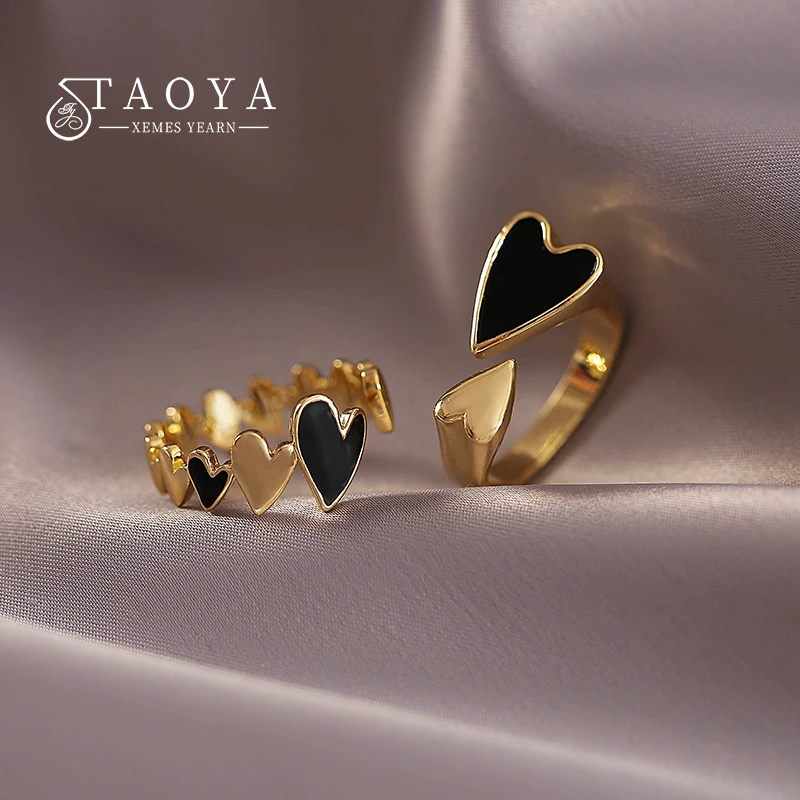 

2022 New Creative Metal Black Enamel Peach Heart Stitched Gold Color Rings Accessories For Women at Korean Fashion Jewelry Party