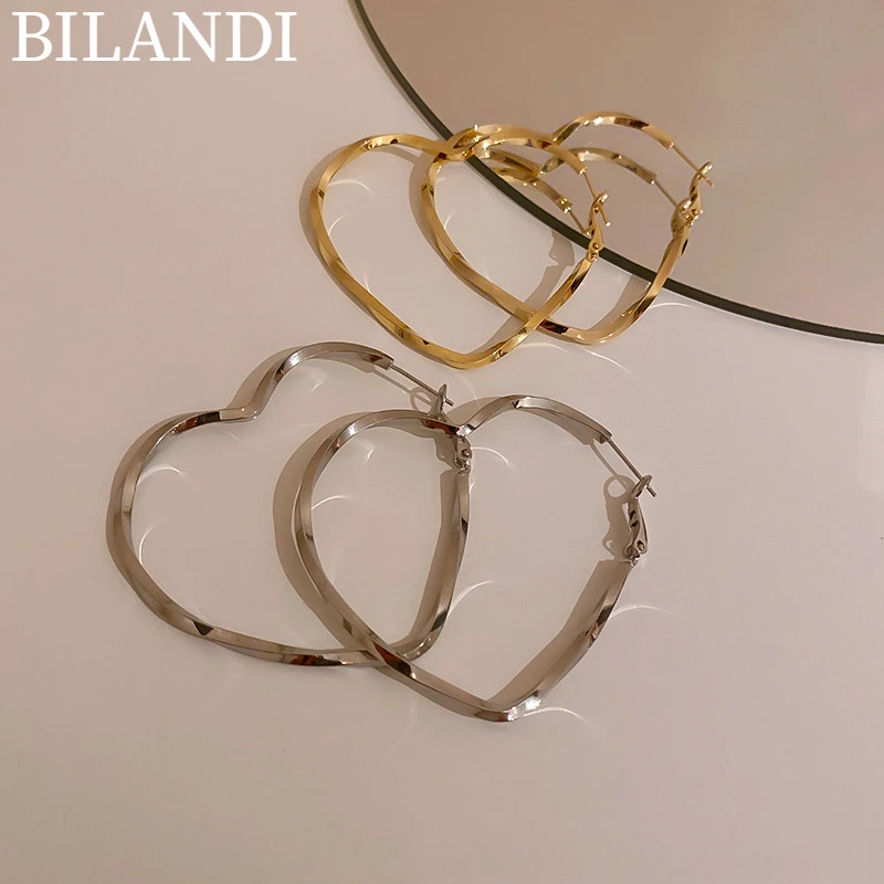 

Bilandi S925 needle Modern Jewelry Heart Earrings Popular Design Hot Selling Metal Drop Earrings For Girl Lady Gifts