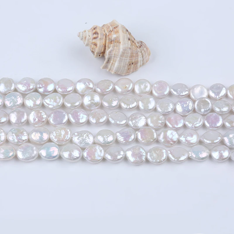 

Пресноводные жемчужины белого цвета в форме монеты 10-11 мм для изготовления ювелирных изделий