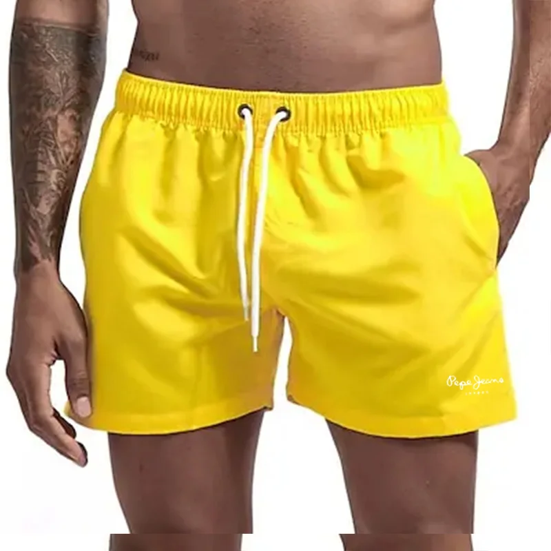 Короткие мужские товары быстро загруженные пляжные имбирытые короткие модные 2024