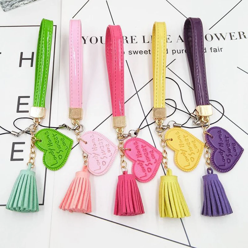 

Wrist Anti-Lost Hanging Cord PU Leather Rope Love Heart Tassel Charm Mobile Phone Strap Mobile Phone Case Lanyard Wholesale