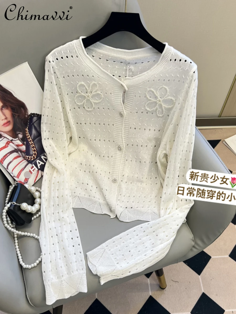 

2022 Autumn New Heavy Beads Flower Cutout Round Neck Long Sleeve Knitted Top Women's Short Temperamental Cardigan All-Matching