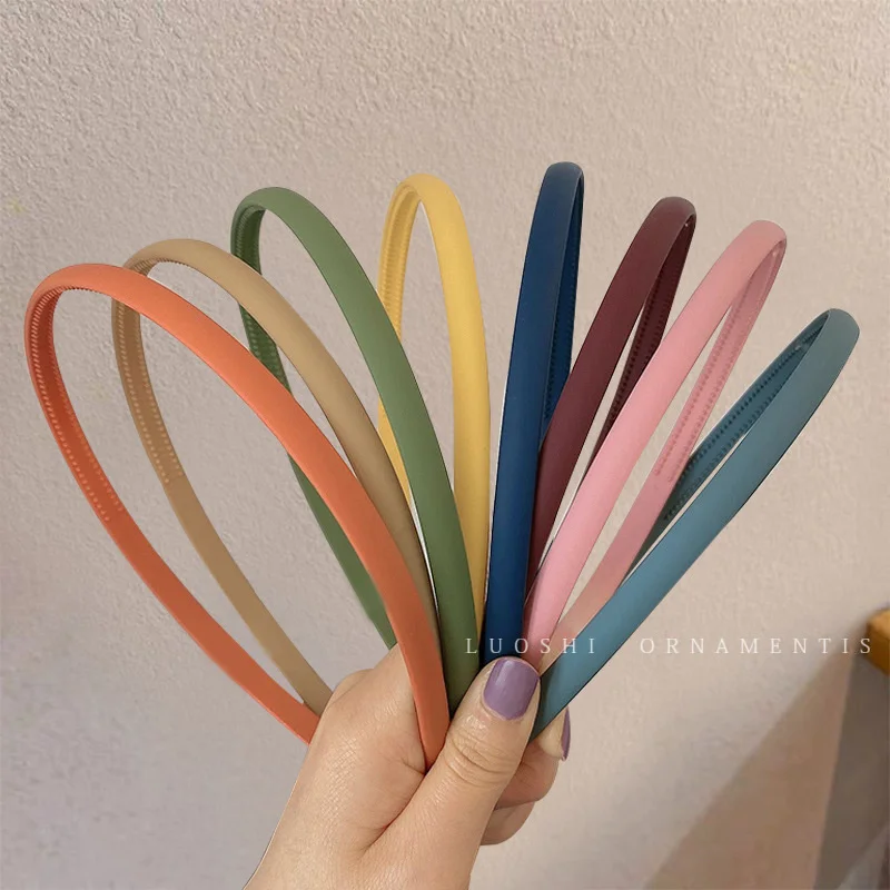 

Candy color hair hoop women's Korean face washing and pressing hair with teeth and anti-skid fine edge Hair binding headband