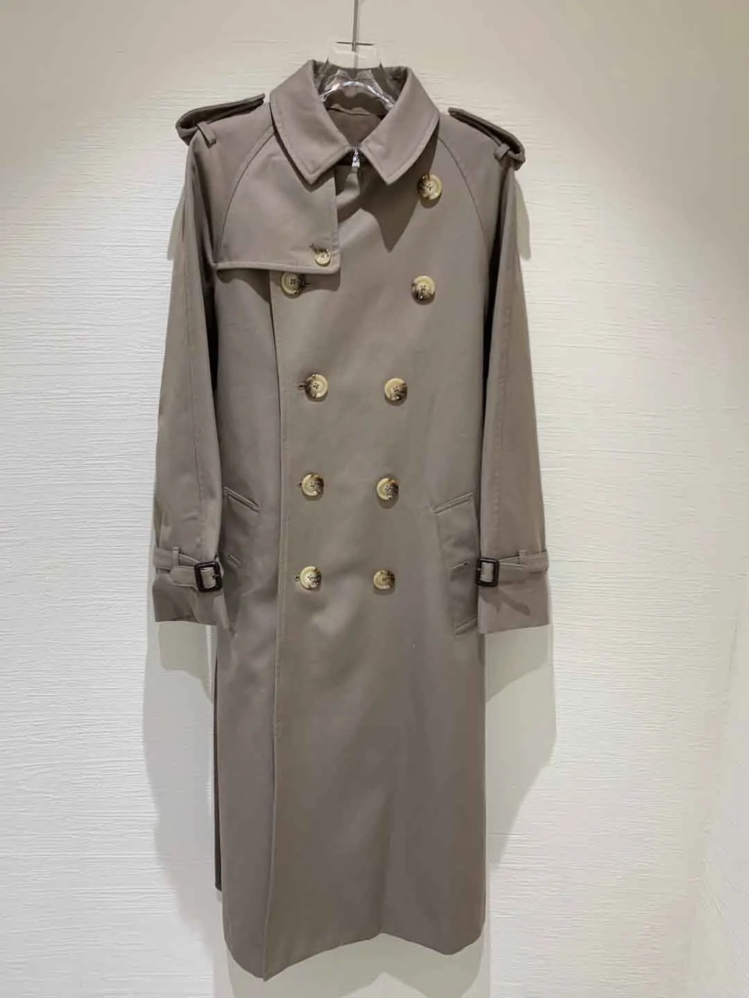 

The new blended wool and cotton trench coat is stiff and drape