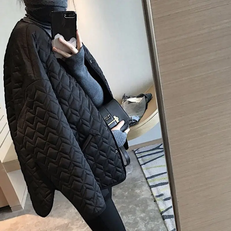 Рисунок 4 - Куртка женская короткая зимняя в клетку