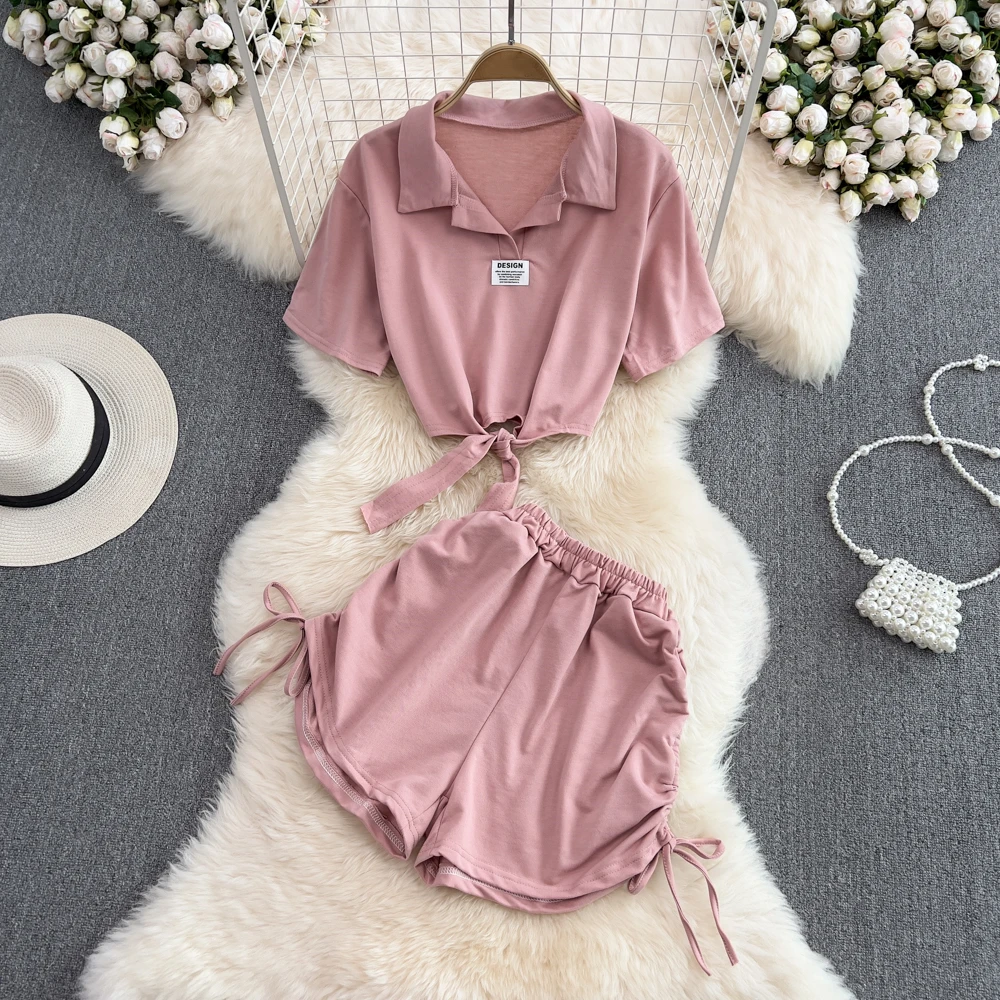 

Clothland Women Chic Y2K Sporty Crop Top Shorts Suit Two Piece Set Short Sleeve Shirt Mini Shorts Sexy Suits TZ466