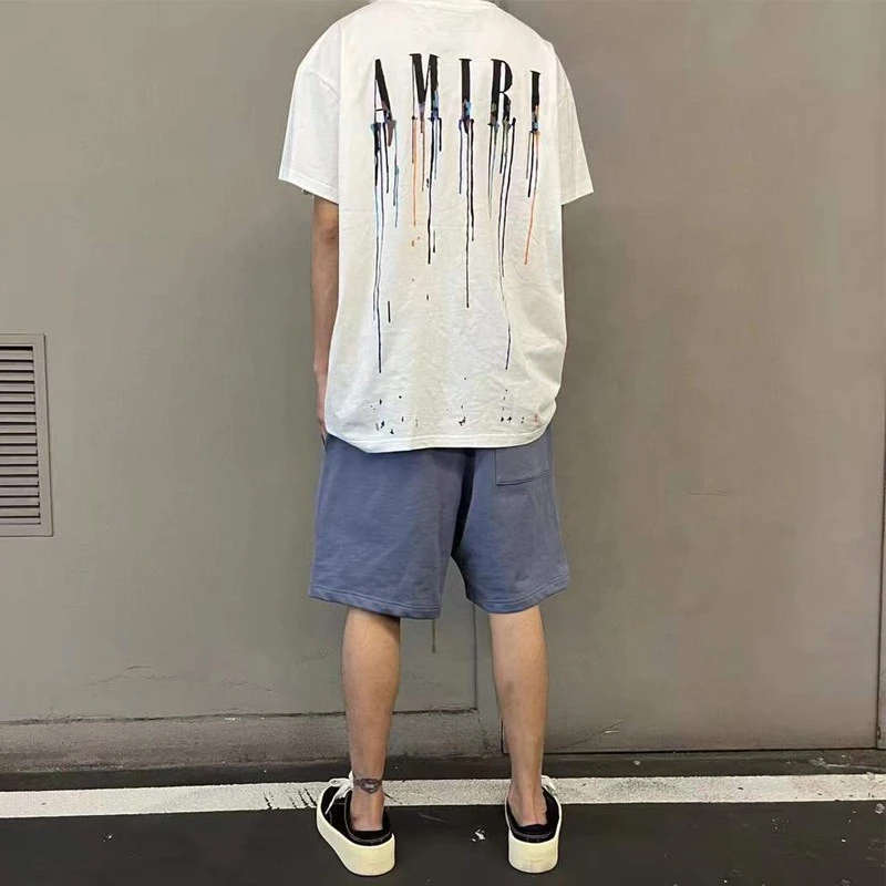 

2022 New Amiri Spring and Summer New Ink Splashed Tassel Printed Cotton Fashion Short-sleeved T-shirt Men and Women with the Sa