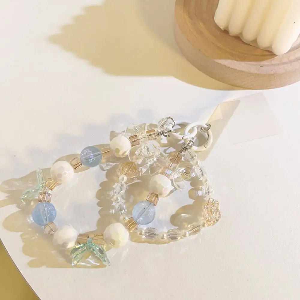 Ремешок на запястье с бантом цепочка для телефона расшитый бисером белый синий