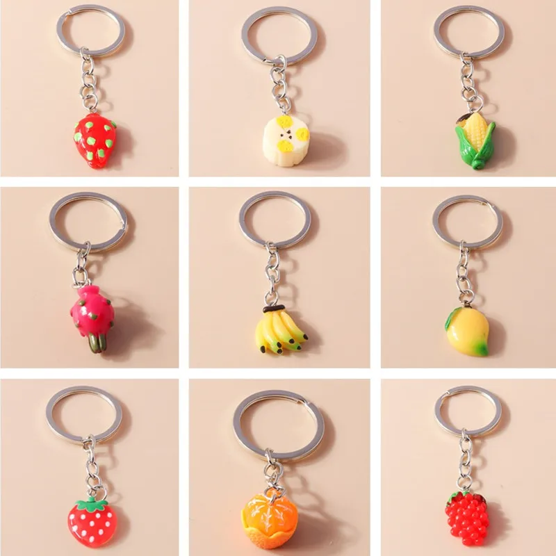 

Cute Fruit Keychians Resin Banana Strawberry Grape Keyrings Souvenir Gifts for Women Men Car Key Handbag Pendants Key Chains