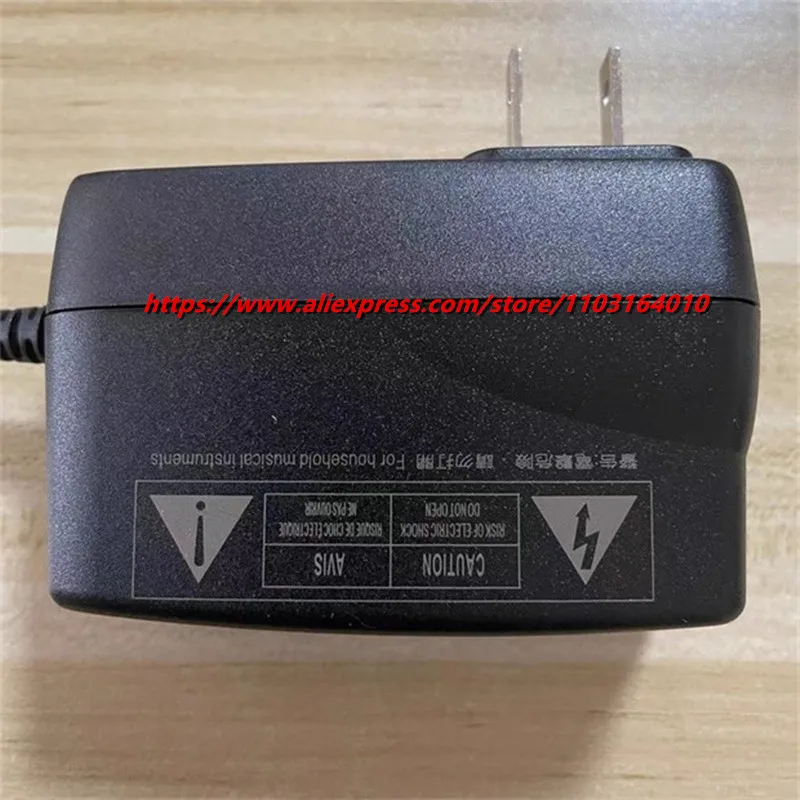 Фото Новый оригинальный адаптер переменного тока AD-E95100LU 9.5V 1.0A для клавиатуры Casio PSM10A-095(VE), блок питания AD-E95100LW №4